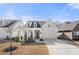 Beautiful single-Gathering home featuring a two-car garage, manicured lawn, and inviting front porch at 1929 Finnish Ln, Kennesaw, GA 30152