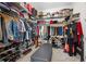 Spacious walk-in closet with custom shelving and rods for clothing and shoe storage at 1929 Finnish Ln, Kennesaw, GA 30152
