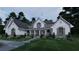 Charming farmhouse-style home featuring a welcoming front porch and beautiful landscaping at 237 Barbara Sw Ln, Mableton, GA 30126