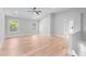 Spacious bedroom with vaulted ceilings, two windows, and light hardwood floors at 2517 Hampton Park Ct, Marietta, GA 30062