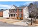 Charming two-story home featuring a classic brick facade, black shutters and a well-manicured lawn at 2517 Hampton Park Ct, Marietta, GA 30062