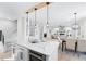 Open kitchen featuring a marble island flowing into living and dining areas at 2517 Hampton Park Ct, Marietta, GA 30062