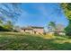 View of house from expansive backyard with lush lawn at 2628 Miriam Ln, Decatur, GA 30032