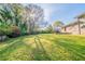 Large backyard with mature trees and lawn at 2628 Miriam Ln, Decatur, GA 30032