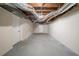 Spacious basement with concrete flooring and exposed ductwork at 2628 Miriam Ln, Decatur, GA 30032