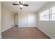 Bedroom featuring carpet flooring, a ceiling fan, and natural light at 2628 Miriam Ln, Decatur, GA 30032