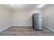 Stainless steel refrigerator in an updated kitchen with laminate flooring at 2628 Miriam Ln, Decatur, GA 30032