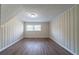 Room with wood flooring, neutral colored walls, and a window at 2628 Miriam Ln, Decatur, GA 30032