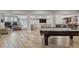 Finished basement with hardwood floors, rec space, and small kitchen area at 2814 Adams Oaks Ln, Marietta, GA 30062
