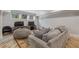 Basement rec room with comfortable seating, a large area rug, and media center at 2814 Adams Oaks Ln, Marietta, GA 30062