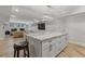 Basement kitchen island provides seating and storage in an open floor plan at 2814 Adams Oaks Ln, Marietta, GA 30062