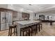 Basement kitchen features stainless appliances, granite countertops and a large island with seating at 2814 Adams Oaks Ln, Marietta, GA 30062