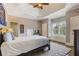 Bedroom featuring a trey ceiling, hardwood floors, and a comfortable queen size bed at 2814 Adams Oaks Ln, Marietta, GA 30062