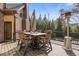 Spacious deck with outdoor dining area, featuring a wooden table with chairs and a standing patio heater at 2814 Adams Oaks Ln, Marietta, GA 30062