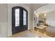 Elegant entryway with wrought iron doors leading to a spacious living area at 2814 Adams Oaks Ln, Marietta, GA 30062