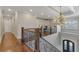Foyer area with hardwood flooring, ornate metal railing and chandelier at 2814 Adams Oaks Ln, Marietta, GA 30062