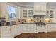 Stylish kitchen with white cabinetry, granite countertops, and stainless steel gas range at 2814 Adams Oaks Ln, Marietta, GA 30062