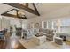 Bright, open-concept living room with hardwood floors, high ceilings, and lots of natural light at 2814 Adams Oaks Ln, Marietta, GA 30062
