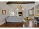 Open living room featuring a stone fireplace, vaulted ceiling, and hardwood floors at 2814 Adams Oaks Ln, Marietta, GA 30062