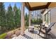 Inviting porch with rocking chairs and beautiful landscaping, ideal for relaxing outdoors at 2814 Adams Oaks Ln, Marietta, GA 30062
