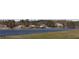 Panoramic view of waterfront homes along the lakefront, offering a serene and picturesque setting at 3274 Jodeco Pl, Jonesboro, GA 30236