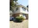 View of the side exterior showing siding and brick, and shuttered windows at 3274 Jodeco Pl, Jonesboro, GA 30236