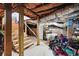 Exposed basement with unfinished ceiling and wooden steps at 1503 Westwood Sw Ave, Atlanta, GA 30310