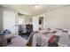 Bedroom with workout station, door access, and natural lighting at 1503 Westwood Sw Ave, Atlanta, GA 30310