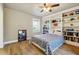 Cozy bedroom with built-in shelving and natural light at 1503 Westwood Sw Ave, Atlanta, GA 30310