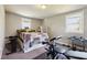 Bedroom with weights, exercise equipment, and a large window for natural light at 1503 Westwood Sw Ave, Atlanta, GA 30310