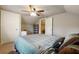 Bedroom with a large ceiling fan and two door entrances for easy access at 1503 Westwood Sw Ave, Atlanta, GA 30310