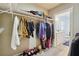 Walk-in closet leading to a bright bathroom at 1503 Westwood Sw Ave, Atlanta, GA 30310