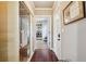 Hallway featuring modern flooring and a glimpse into a beautifully styled room at 1503 Westwood Sw Ave, Atlanta, GA 30310