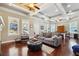 Comfortable living room with coffered ceilings, large windows, and hardwood floors at 1503 Westwood Sw Ave, Atlanta, GA 30310