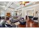 Open-concept living space with coffered ceilings seamlessly connecting to the dining and billiards areas at 1503 Westwood Sw Ave, Atlanta, GA 30310