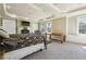 Spacious main bedroom with tray ceiling, fireplace, and abundant natural light at 1503 Westwood Sw Ave, Atlanta, GA 30310