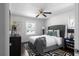A modern bedroom features a gray tufted headboard and zebra print rug at 1882 Rosewood Rd, Decatur, GA 30032