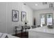 Cozy dining area features modern furnishings, stylish decor, and plenty of natural light at 1882 Rosewood Rd, Decatur, GA 30032