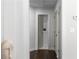 Hallway with dark floors and views of other rooms at 1882 Rosewood Rd, Decatur, GA 30032