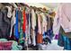 Organized walk-in closet featuring ample storage space and metal shelving for clothes and personal items at 2026 Ellison Nw Way # 13, Kennesaw, GA 30152