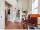 Spacious entryway with high ceilings, wood floors, and a staircase to the upper level at 2026 Ellison Nw Way # 13, Kennesaw, GA 30152