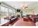 Comfortable living room with fireplace, large windows, and wood flooring at 2026 Ellison Nw Way # 13, Kennesaw, GA 30152