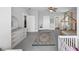 A bright bedroom with a decorative rug, a modern dresser and an A-frame bed at 3020 Barnes Mill Ct, Roswell, GA 30075