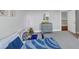The room offers a fun playful atmosphere, light carpet and neutral paint at 3020 Barnes Mill Ct, Roswell, GA 30075
