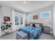 Bright bedroom with neutral decor, including french doors, large bed, and modern bedside tables at 3020 Barnes Mill Ct, Roswell, GA 30075