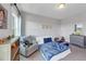The room offers a fun playful atmosphere, light carpet and neutral paint at 3020 Barnes Mill Ct, Roswell, GA 30075