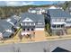 Charming two-story home featuring a welcoming porch, well-maintained landscaping, and an attached two-car garage at 3020 Barnes Mill Ct, Roswell, GA 30075