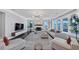 Spacious living room with fireplace, large windows, and stylish decor at 3020 Barnes Mill Ct, Roswell, GA 30075