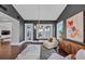 Cozy living room with elegant furniture, stylish lighting, and access to outdoor living space, perfect for entertaining at 3020 Barnes Mill Ct, Roswell, GA 30075
