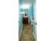 Convenient full bathroom features tile floors and a wood vanity at 4130 N Quail Dr, Douglasville, GA 30135